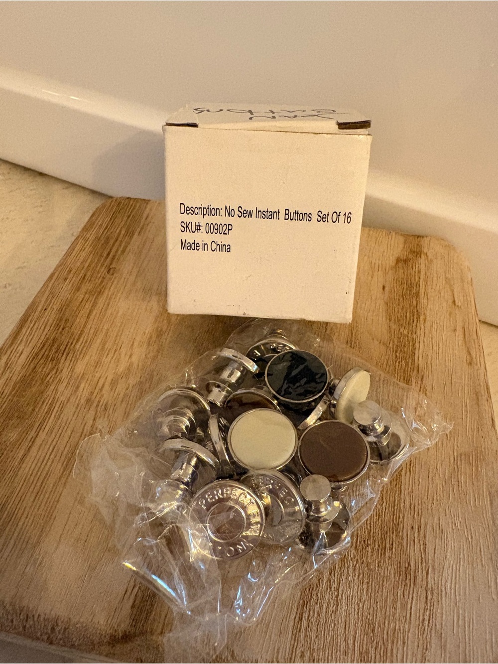 These are "Perfect Fit" style no-sew instant buttons, a set of 16
